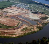 Island Park Development on the Red River in Shreveport, LA. ARE Consultants, Inc. performed planning and coordination with the Metropolitan Planning Commission for over $20,000,000 of roads, utilities, and marine construction.
